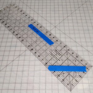 Acrylic ruler marked with painter's tape