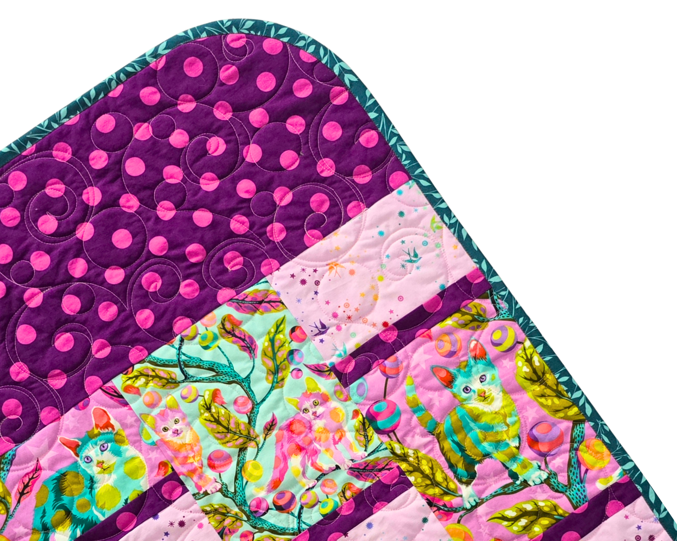 How to Bind Quilts with Rounded Corners – No Cutting on the Bias!